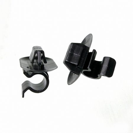 Фіксатори тяги замків та упори капота